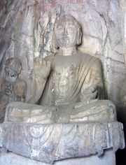 A Tang Dynasty sculpture of Amitabha Buddha, found in the Hidden Stream Temple Cave, Longmen Grottoes, China indicates.