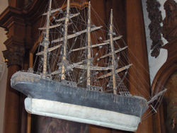Church votive hanging up in a church; the workmanship is somewhat crude, but sufficient to identify as mid-19th-century