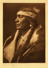 An Atsina named Assiniboin BoyPhoto by Edward S. Curtis.
