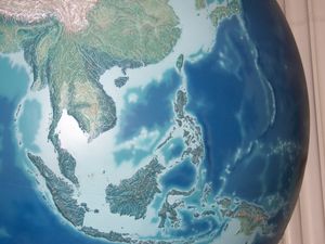 Relief Map of SE Asia on the globe at the Field Museum, Chicago, Illinois, United States 