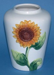 A vase with a sunflower pattern