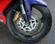 Modern motorcycle wheel with disc brake.